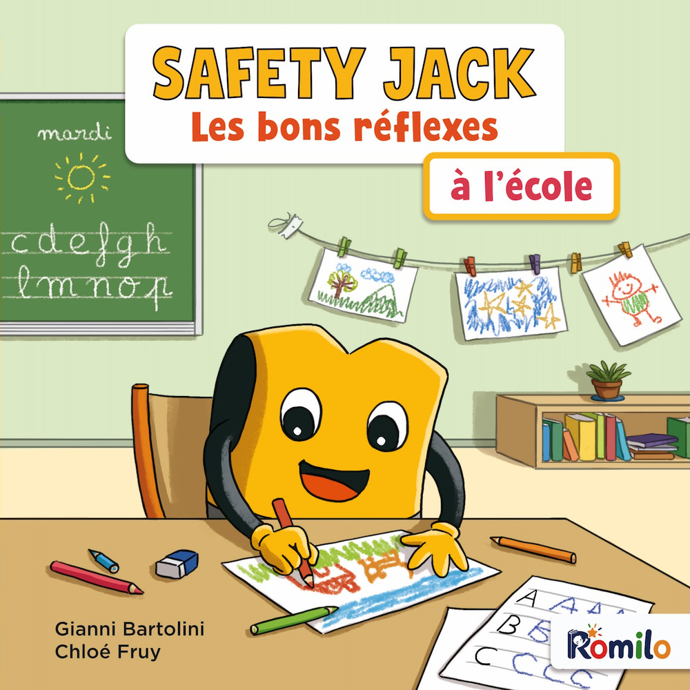 Safety Jack assis à son bureau d'école, en train de dessiner